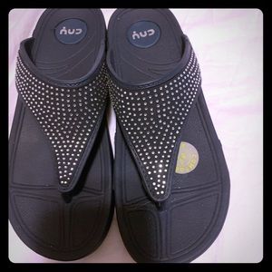 CNY navy and rhinestone flip flops.